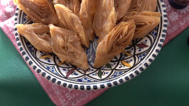 Baklava close-up sweet desert food. Tradition Crimean Tatar Dessert from dough on plate.