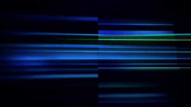 This captures a stunning visual representation of blue light streaks moving swiftly across a dark background, evoking a sense of high-tech gadgetry and digital malfunction.