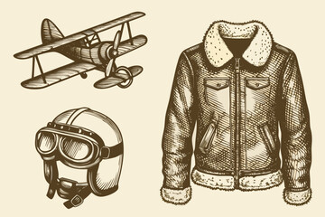 Vintage aviation equipment including a biplane helmet and leather jacket © Aduri