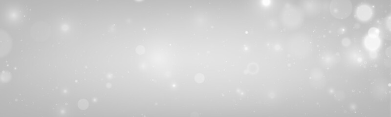 PNG. White sparkles drift gently on a glowing soft backdrop. Blurred highlights add subtle elegance and depth. Perfect for festive greeting cards and designs.  © goldstock
