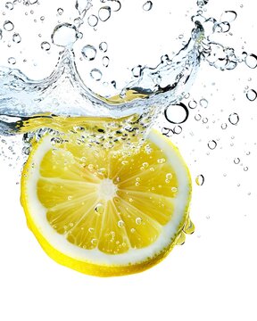 Lemon slice falling into w