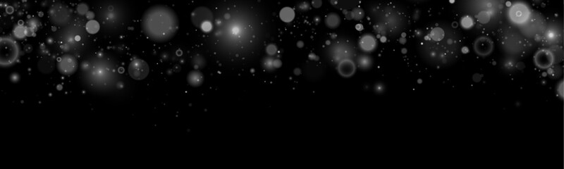 Magical white glitter sparkles drift across the dark background. Tiny bokeh lights illuminate softly. Perfect for holiday, festive, and fantasy designs. © goldstock