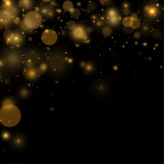 Bright golden glitter cascades like soft firework sparks. Light glows add depth and warmth. The composition feels magical and joyful. © goldstock