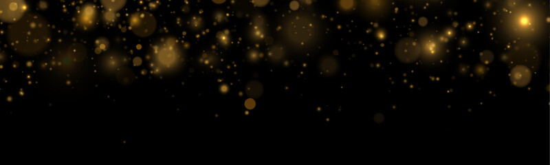 Glittering particles shine in a flowing abstract pattern. Warm golden bokeh creates depth and elegance. The composition feels bright and festive. © goldstock