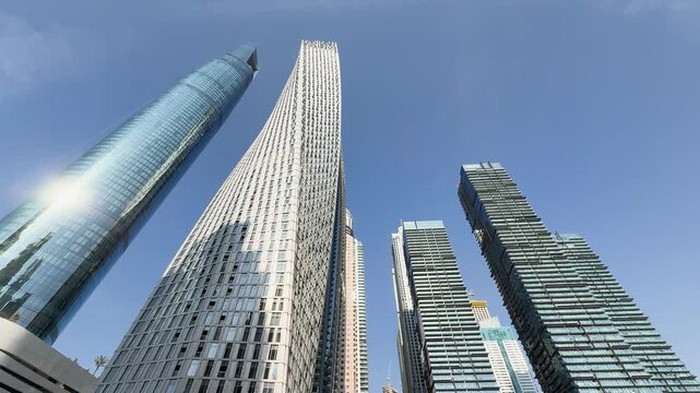 Low angle view of Dubai Marina skyscrapers in Dubai, United Arab Emirates