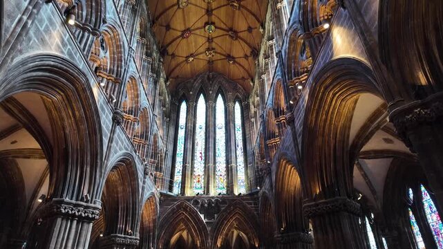 Interior of medieval Glasgow Cathedral with Gothic arches in Glasgow, UK