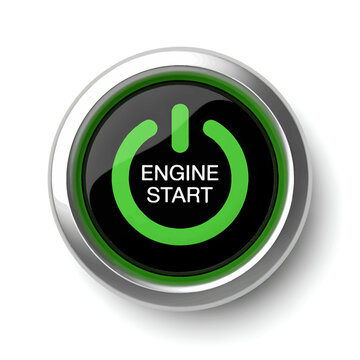Green engine start button with silver border and black background