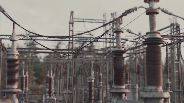 Industrial electrical substation structures and insulators processing and distributing high voltage electricity throughout the energy grid and national infrastructure