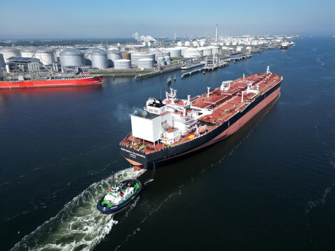 Rotterdam, The Netherlands - May 19th 2024 -Aerial view of an oil tanker in the port of Rotterdam
