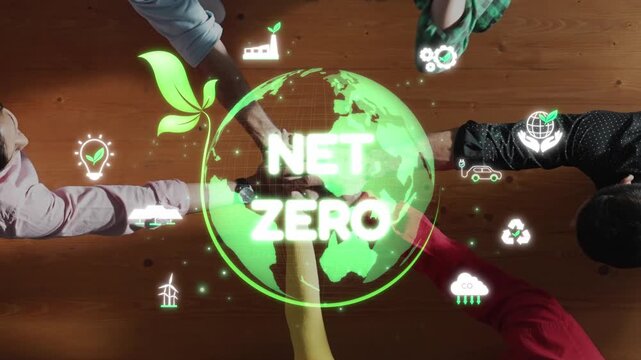 Hands engage around a green globe symbolizing net zero commitment, highlighting sustainability, environmental responsibility, and collaborative efforts for a better future. Raster