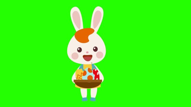 Cute Easter bunny carrying eggs in a cart animation on a green background, chroma key footage