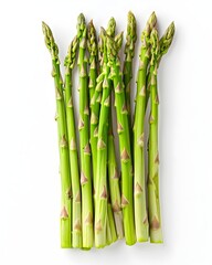 Fototapeta premium Top-down view of asparagus tips with natural green gradients isolated on white background 