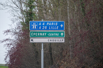Fototapeta premium Road signes, driving directions on roundabout, street, highway, travel destination in Champagne, touristic route, France