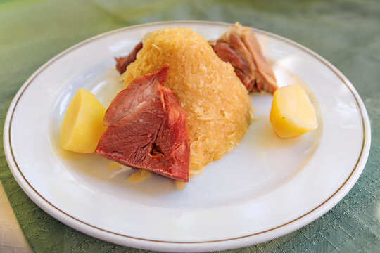 Alsacian choucroute garnie sauerkraut with sausages and meats Strasbourg, France