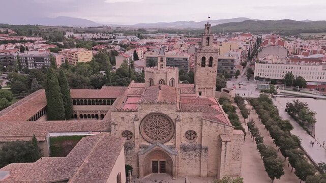 Aerial drone flying over sant cugat del valles monastery in spain