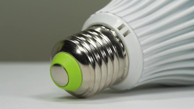 E27 base of LED lamp, close-up shot video