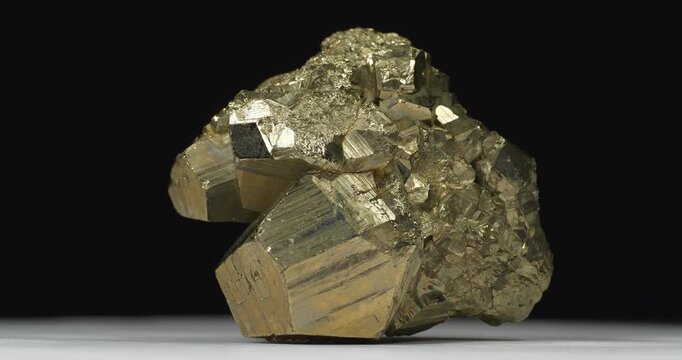 Pyrite mineral, also known as fools gold, shiny iron sulfide in natural crystal form