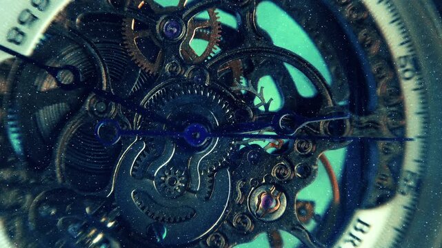 Beautiful internal structure of a skeleton wristwatch where shiny gears, wheels and hands move. View through sparkling particles. Closeup. Macro