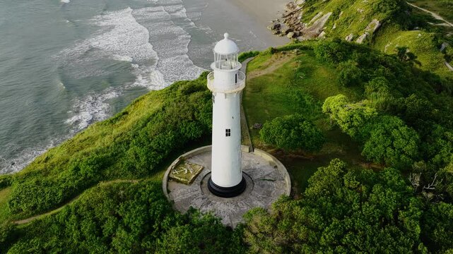Farol das Conchas lighthouse scenic view at Ilha do Mel, Brazil