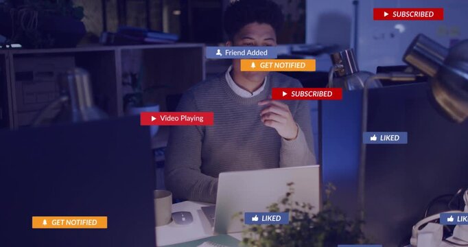 Midadult man focusing laptop send msg prompt appearing, badges cascading, touching chin, refocusing