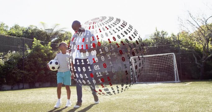 Father guiding son holding ball walking to goal causing binary sphere appearing and showing stats