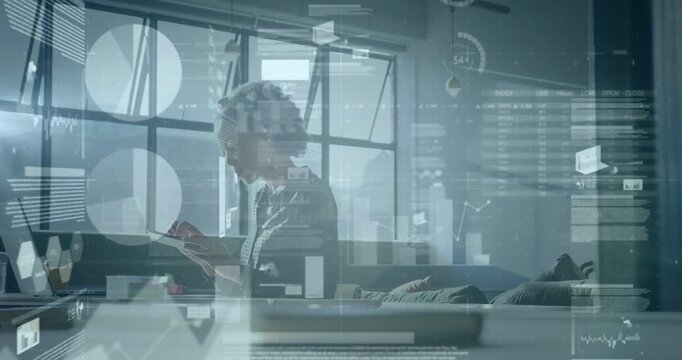 Mid adult woman tapping phone sorting papers placing call as business charts updating over table
