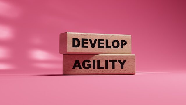Develop agility symbol. Concept word Develop agility on wood cubes.Business and Develop agility concept. Copy space.3D rendering