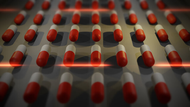 Red and White Drug Pills or Capsules being Produced in Lab