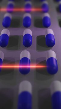 Blue and White Drug Pills or Capsules being Produced in Lab