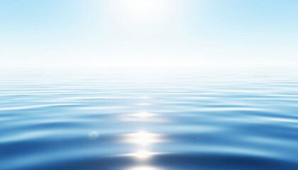 Obraz premium Serene ocean horizon with soft waves under clear blue sky minimalist seascape background