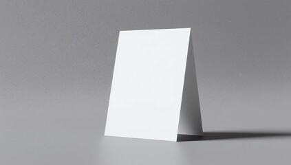 Naklejka premium Promotional table talker isolated on white background, mockup template paper tri-fold vertical triangle cards with reflections. white sheets front & left and right view. 3d render 