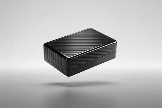 Black rectangular box with textured surface
