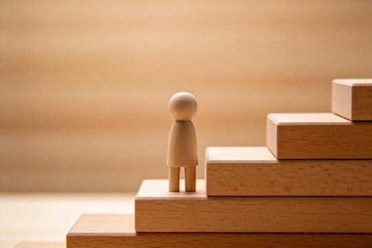 Wooden figure on staircase steps