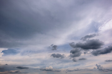 Obraz premium Dark sky with stormy clouds. Dramatic sky rain,Dark clouds before a thunder-storm,clouds before rain