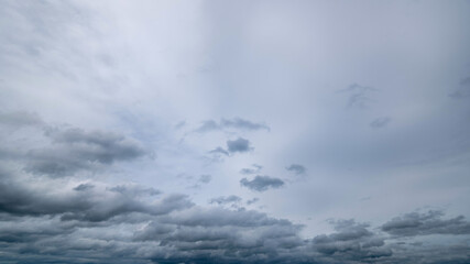Obraz premium Dark sky with stormy clouds. Dramatic sky rain,Dark clouds before a thunder-storm,clouds before rain
