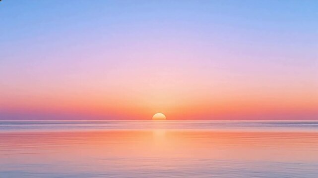 Sunset over calm ocean horizon