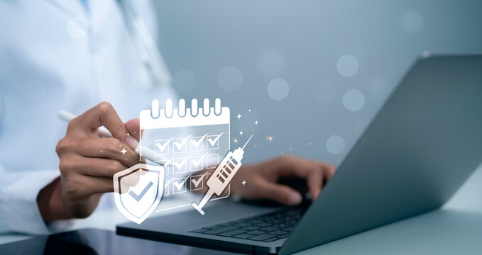 Vaccination schedule healthcare protection concept doctor hand using laptop with calendar checklist syringe icon medical immunization patient safety digital health service system monitoring