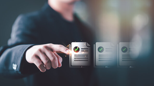 Internal auditor approving corporate policy document through digital compliance system, regulatory verification process, governance control framework, risk assessment ,data protection management