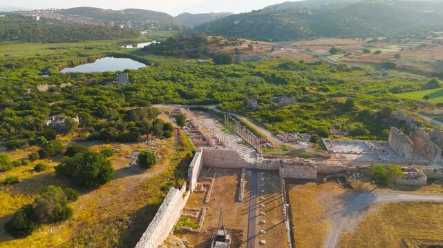 Gelemis, Turkey. Colonnaded Street and Agora in Patara ancient city, main thoroughfare and commercial center of Lycian capital in summer morning. Aerial View, Point of interest