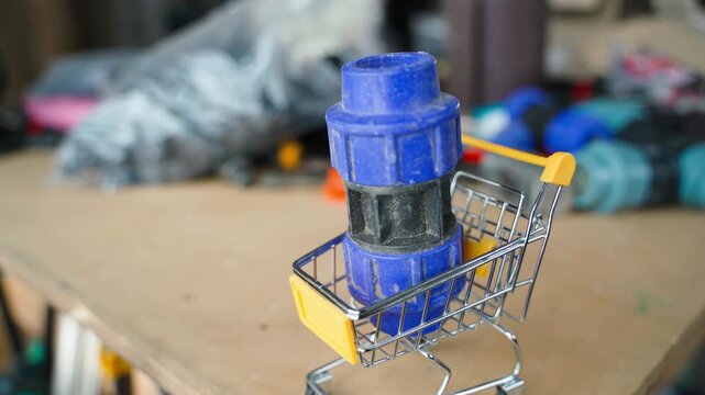 Plumbing pipe adapter being placed into shopping cart