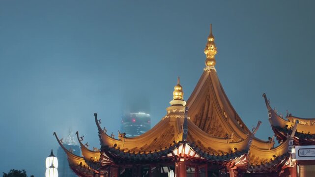 Gold pagoda roof under misty skyline with ornate spires and glowing finials tranquil dusk mood suggesting evening ritual, silent rooftop silhouette against softened city lights, cinematic haze