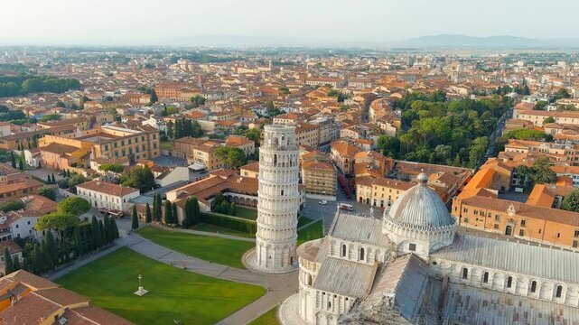 Pisa, Italy. Famous Leaning Tower and Pisa Cathedral in Piazza dei Miracoli. Summer. Morning hours. Drone footage, Point of interest