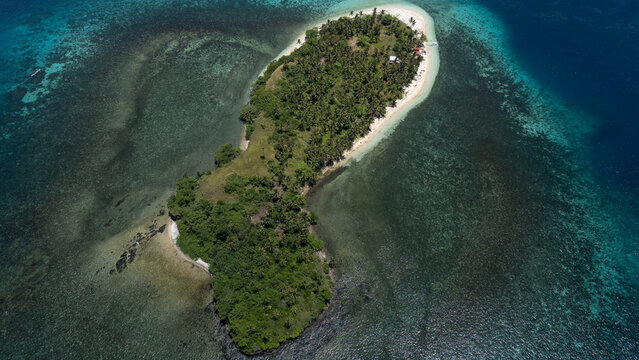 Aerial Photo of Basul Island in Surigao Strait, Philippines with Fringing Reef and White Sand Beach