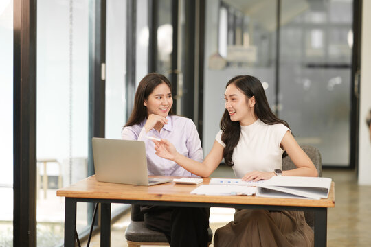 Business Team Analyzing Financial Charts and Data Reports