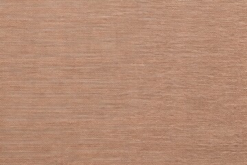 Fototapeta premium Natural light beige woven linen fabric texture closeup