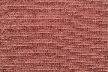Fototapeta premium Natural warm red terracotta textured fabric texture closeup