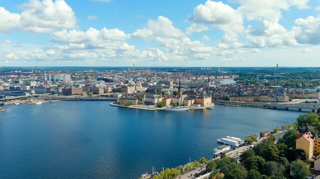 Stockholm, Sweden. Island Riddarholmen and Lake Malaren. Riddarholmen Church. Panorama of the city. Summer day. Drone footage