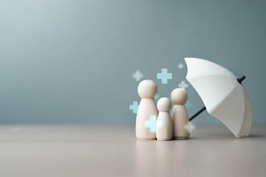 Family figures under umbrella symbolizing health insurance coverage, medical protection, and financial support for healthcare and wellbeing.
