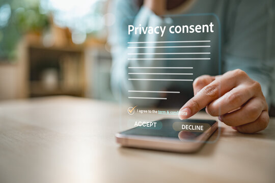 User giving privacy consent on smartphone screen with GDPR interface, highlighting data protection, permissions and legal compliance.