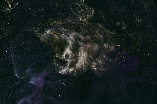 Luxurious abstract dark background. Explosive colors wallpaper, outer space pattern. Dynamic paint backdrop.